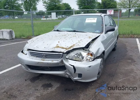 2000 Honda Civic Value Package z USA, uszkodzony, nr VIN 2HGEJ6617YH564856